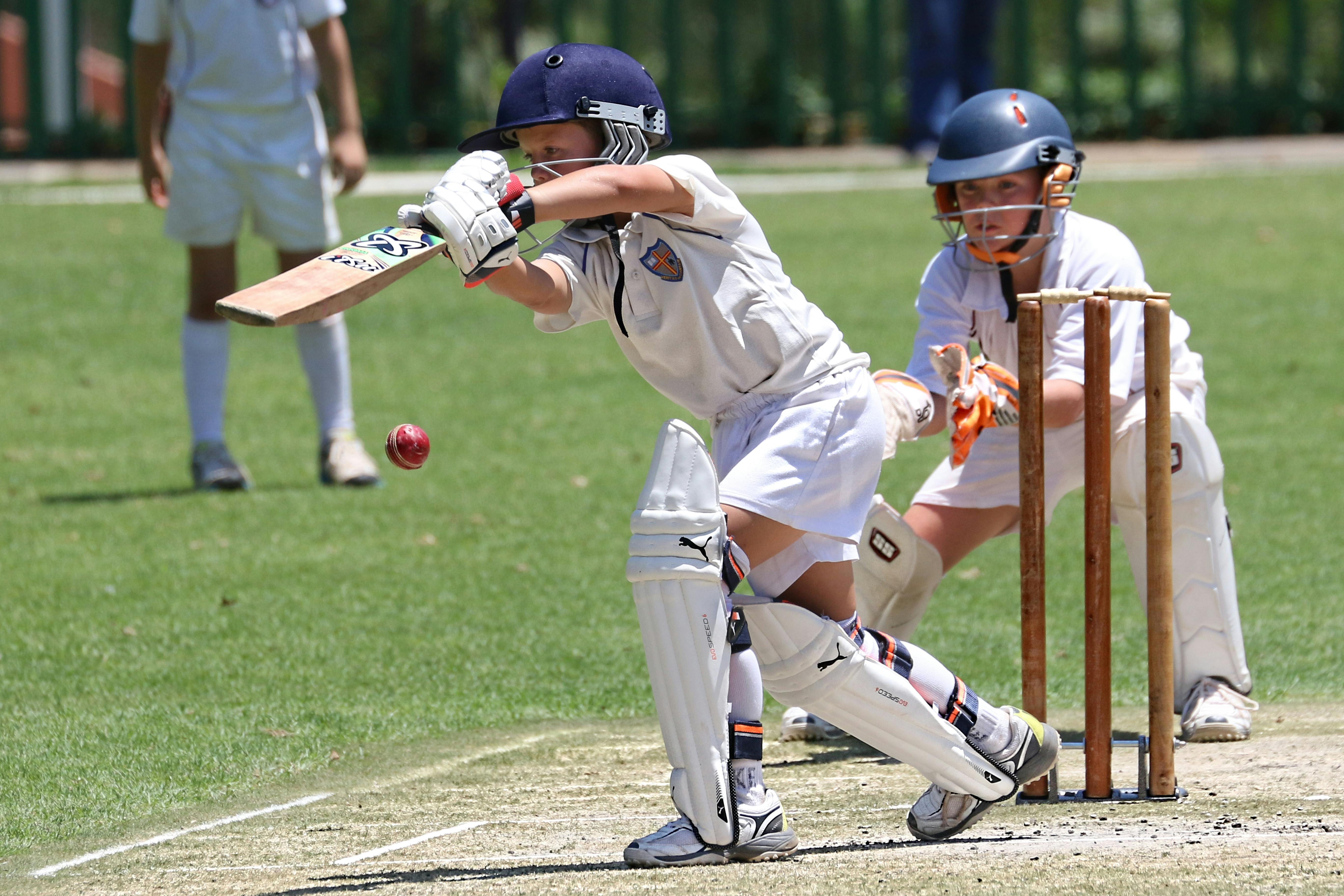 Students playing cricket at school level